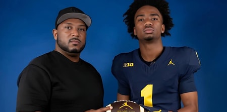 Travis Johnson with his father, Tory Johnson Sr.